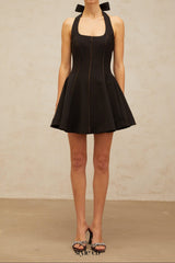 sandy halterneck bow-embellished mini dress in Black