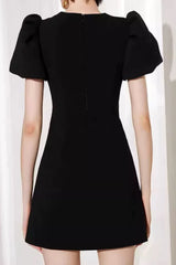 vanessa bow puff sleeve mini dress in black