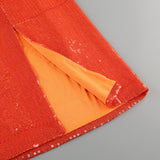 STRAPLESS MIDI DRESS WITH GOLD HARDWARE CUT-DETAIL