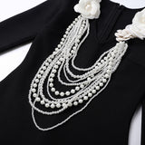 alisa pearl flower embellished bandage mini dress in black