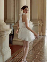 halter embroidered hollow mini dress in white