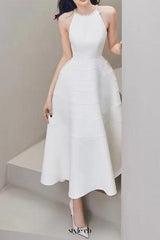 Sleeveless halter neck with diamond midi dress in white