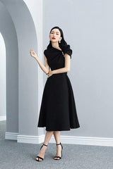 ASYMMETRIC SLEEVE PEARLS MIDI DRESS IN BLACK