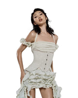 elva halter three-dimensional flower irregular tassel mini dress in Beige