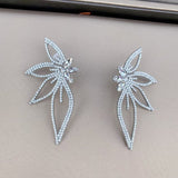 CRYSTAL FLOWER EARRINGS IN SILVER Earrings styleofcb