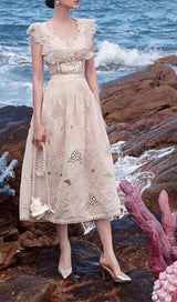 RUFFLED SLEEVELESS MIDI DRESS IN BEIGE DRESS sis label