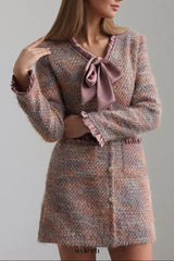 xylia bow v-neck long sleeve mini dress in multicolor