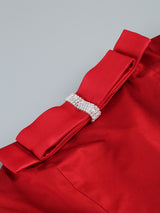 demi bow strapless midi dress in merlot