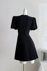 vanessa bow puff sleeve mini dress in black