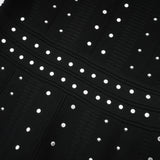 Fabienne black embellished ruffled knitted mini dress