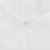 BACKLESS BOW MINI DRESS IN IVORY