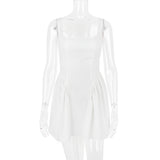 BACKLESS BOW MINI DRESS IN IVORY