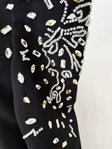 crystal embellished off-shoulder gown in black