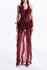 a burgundy evening gown with floral details