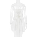BACKLESS BOW MINI DRESS IN IVORY