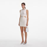 cut out cream boucle pearl mini dress