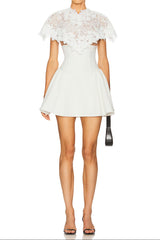 vanessa White mini dress with embroidered lace cape