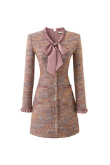 xylia bow v-neck long sleeve mini dress in multicolor