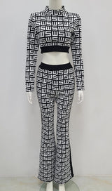 MONOGRAM PRINTED SHOULDER PAD SUIT IN WHITE AND BLACK styleofcb 