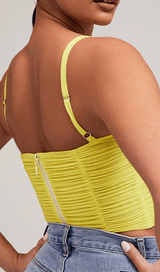 Adjustable sling vest.