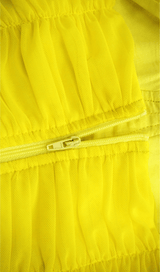 Adjustable sling vest.