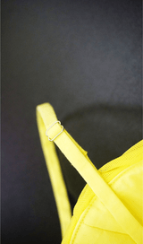 Adjustable sling vest.