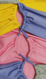 Contrasting irregular stitching dress.