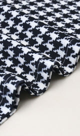 Houndstooth word shoulder wrap dress.