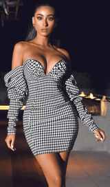 Houndstooth word shoulder wrap dress.